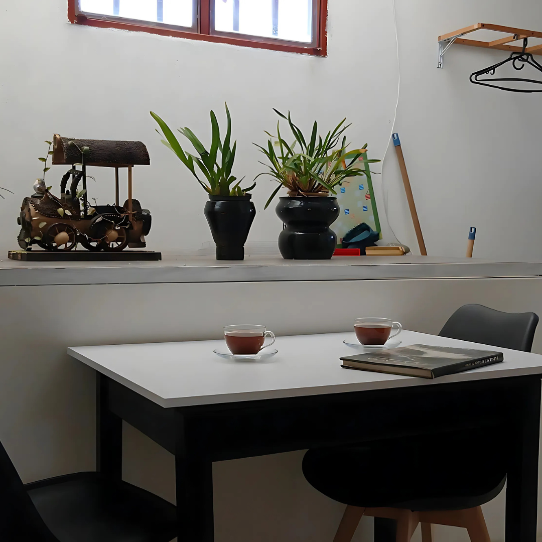 Mesa de onces Alojamiento Casa de T